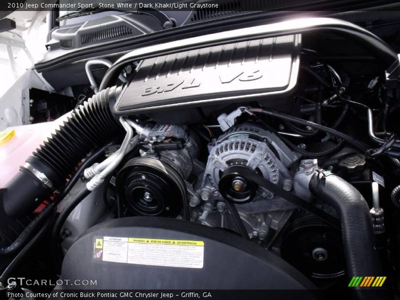 Stone White / Dark Khaki/Light Graystone 2010 Jeep Commander Sport