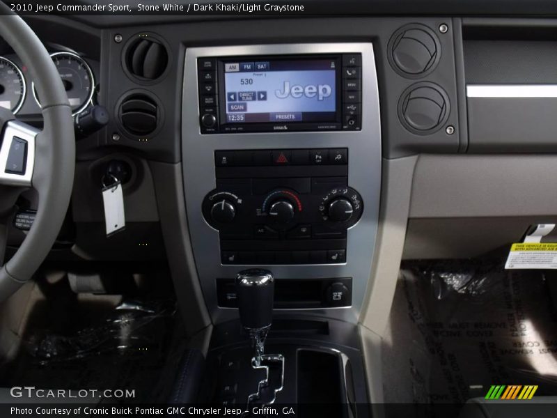Stone White / Dark Khaki/Light Graystone 2010 Jeep Commander Sport