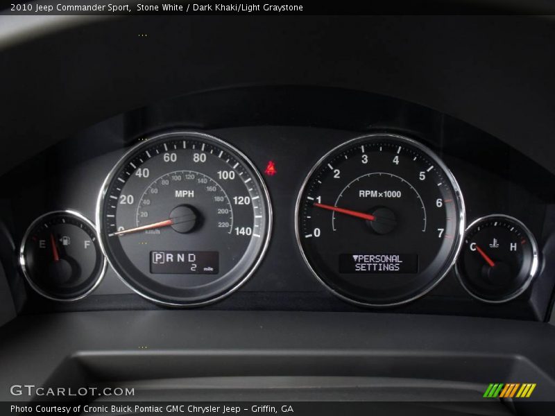 Stone White / Dark Khaki/Light Graystone 2010 Jeep Commander Sport