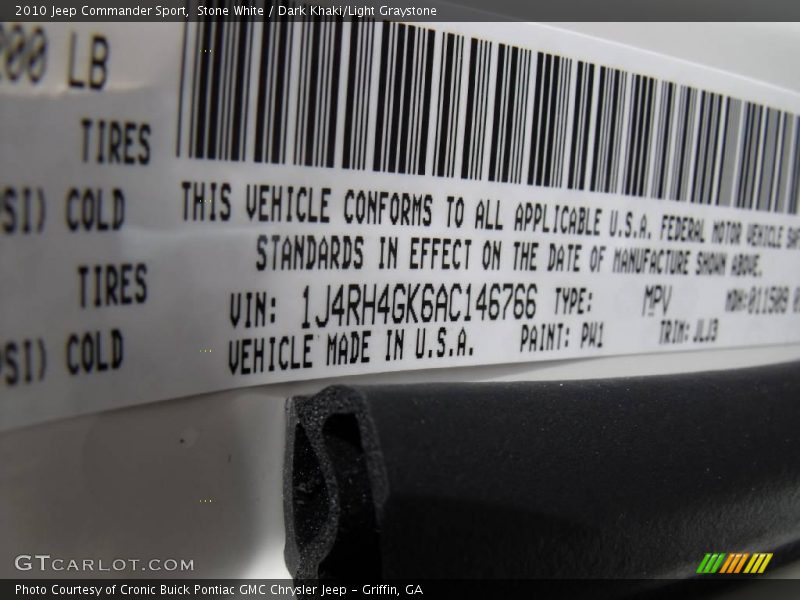 Stone White / Dark Khaki/Light Graystone 2010 Jeep Commander Sport