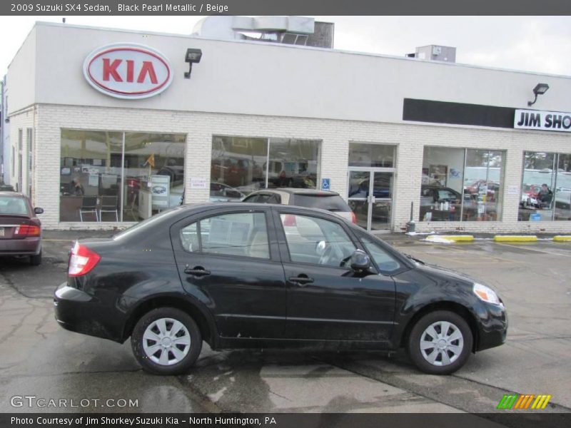 Black Pearl Metallic / Beige 2009 Suzuki SX4 Sedan