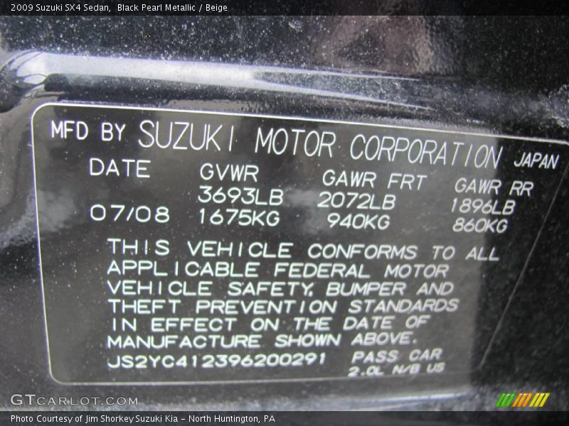 Black Pearl Metallic / Beige 2009 Suzuki SX4 Sedan
