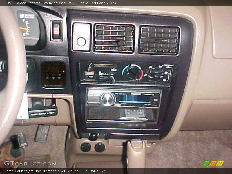 Sunfire Red Pearl / Oak 1999 Toyota Tacoma Extended Cab 4x4
