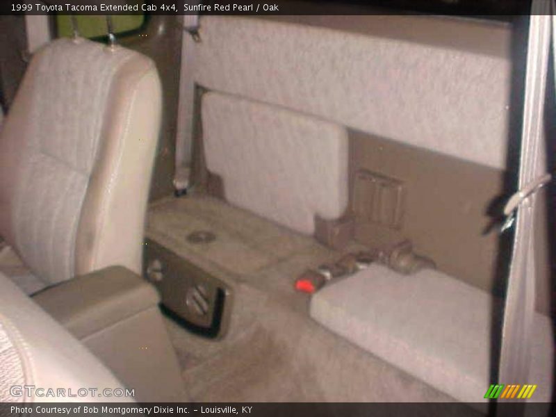 Sunfire Red Pearl / Oak 1999 Toyota Tacoma Extended Cab 4x4