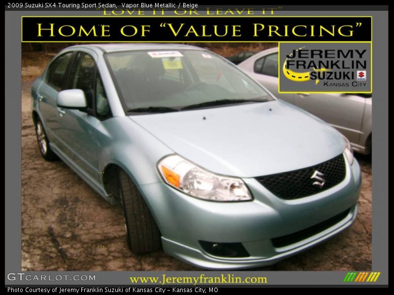 Vapor Blue Metallic / Beige 2009 Suzuki SX4 Touring Sport Sedan