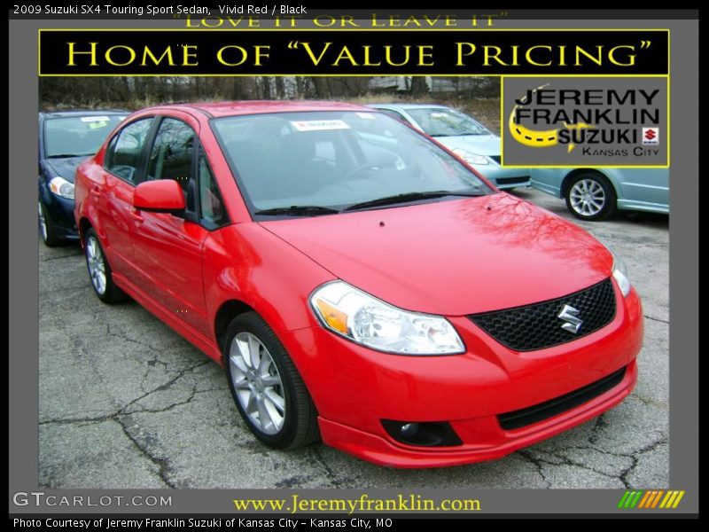 Vivid Red / Black 2009 Suzuki SX4 Touring Sport Sedan
