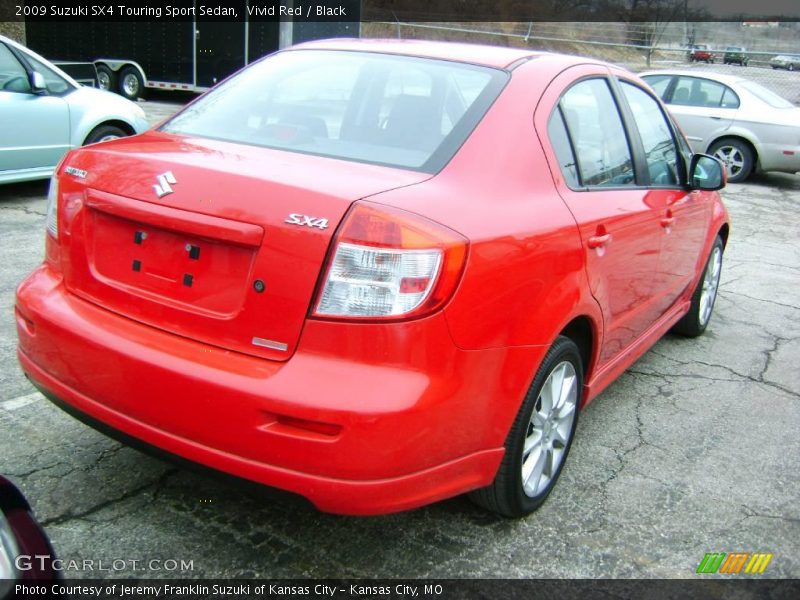 Vivid Red / Black 2009 Suzuki SX4 Touring Sport Sedan