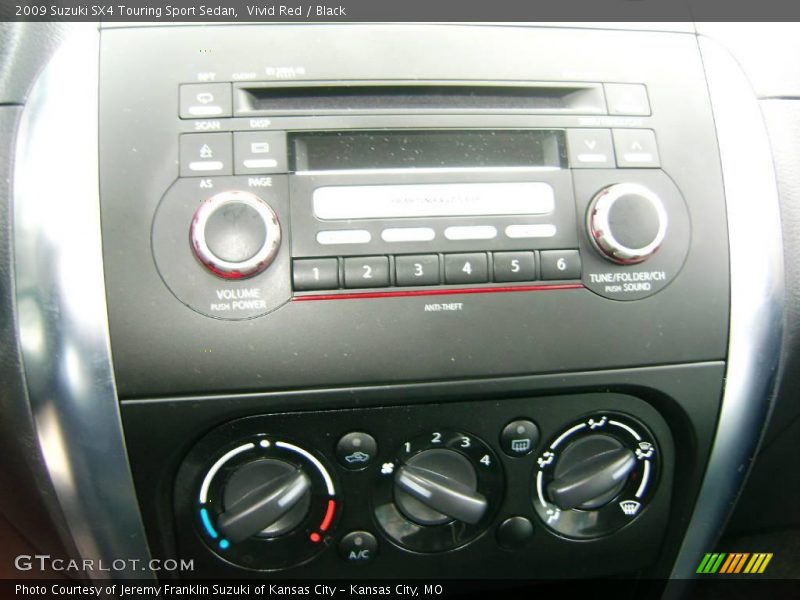 Vivid Red / Black 2009 Suzuki SX4 Touring Sport Sedan