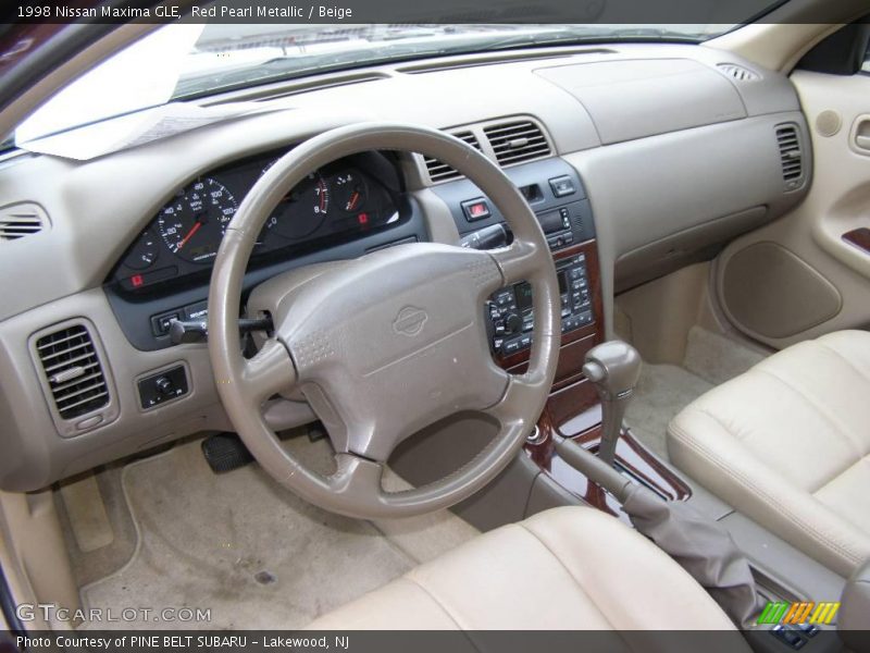 Red Pearl Metallic / Beige 1998 Nissan Maxima GLE