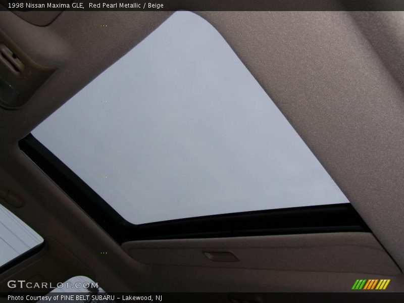 Red Pearl Metallic / Beige 1998 Nissan Maxima GLE