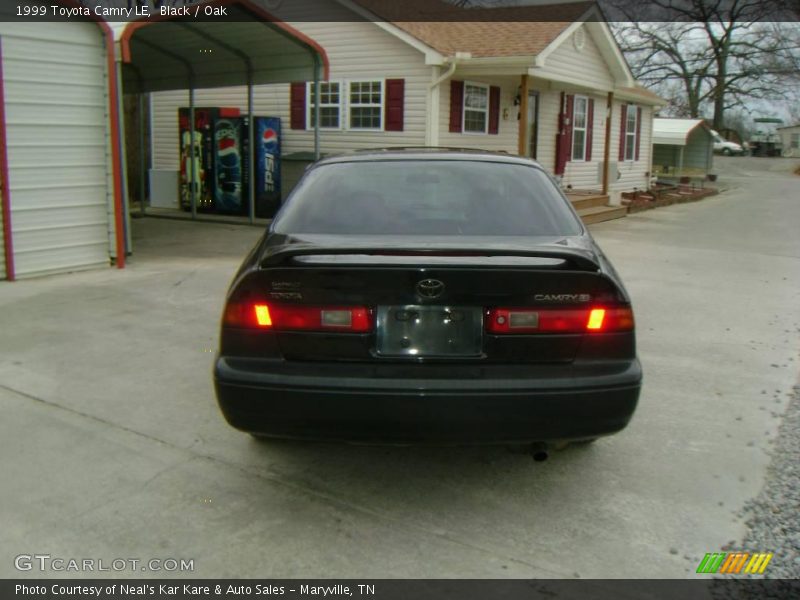 Black / Oak 1999 Toyota Camry LE