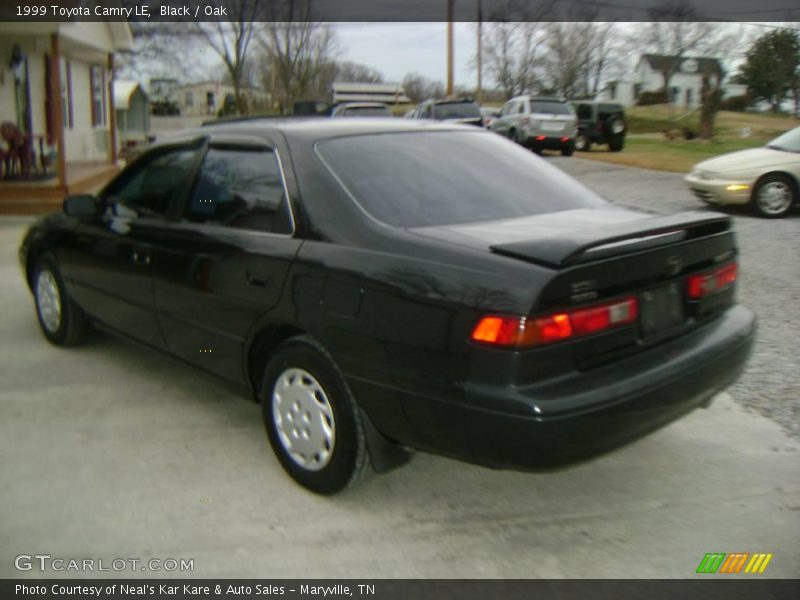 Black / Oak 1999 Toyota Camry LE