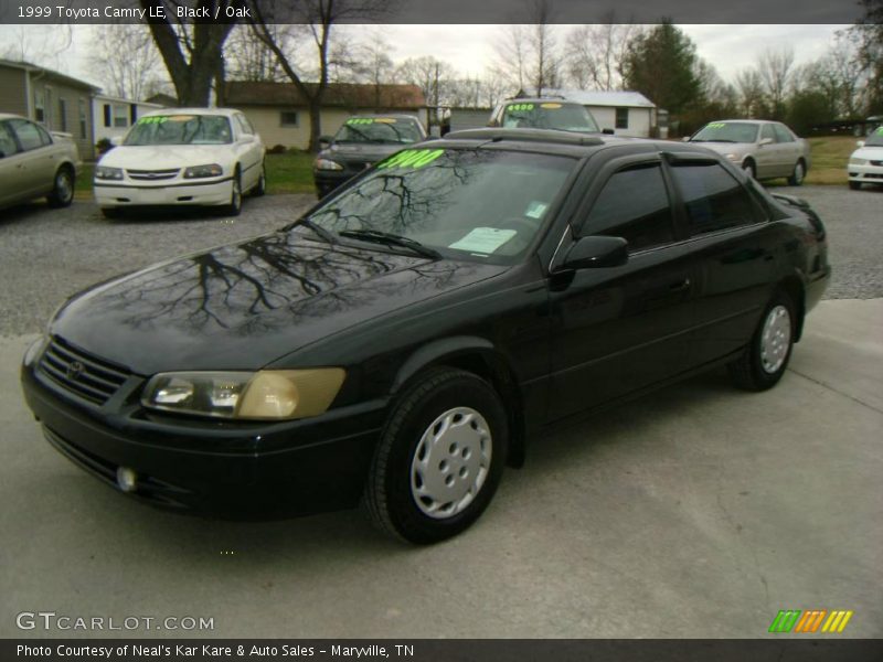 Black / Oak 1999 Toyota Camry LE