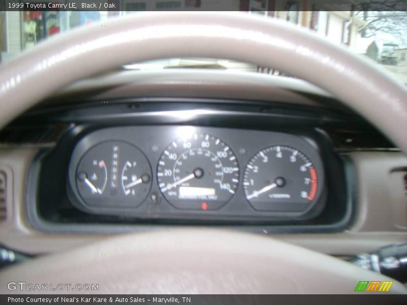 Black / Oak 1999 Toyota Camry LE