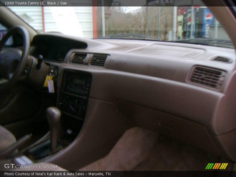 Black / Oak 1999 Toyota Camry LE