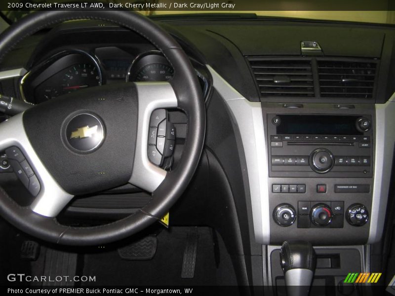 Dark Cherry Metallic / Dark Gray/Light Gray 2009 Chevrolet Traverse LT AWD