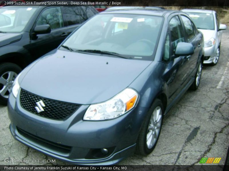 Deep Sea Blue Metallic / Beige 2009 Suzuki SX4 Touring Sport Sedan