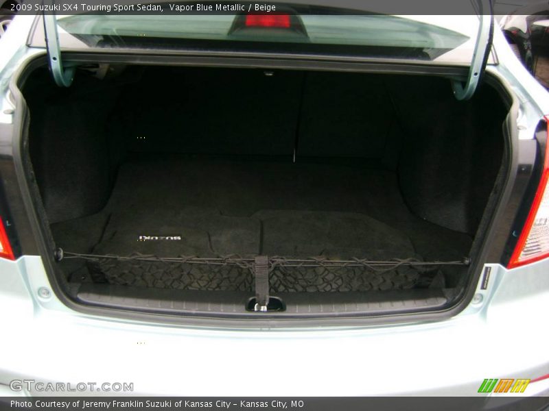 Vapor Blue Metallic / Beige 2009 Suzuki SX4 Touring Sport Sedan