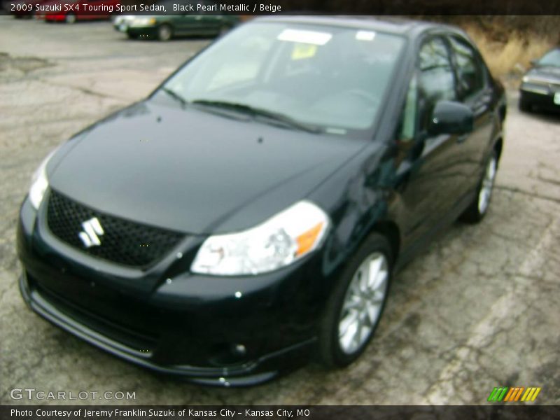 Black Pearl Metallic / Beige 2009 Suzuki SX4 Touring Sport Sedan