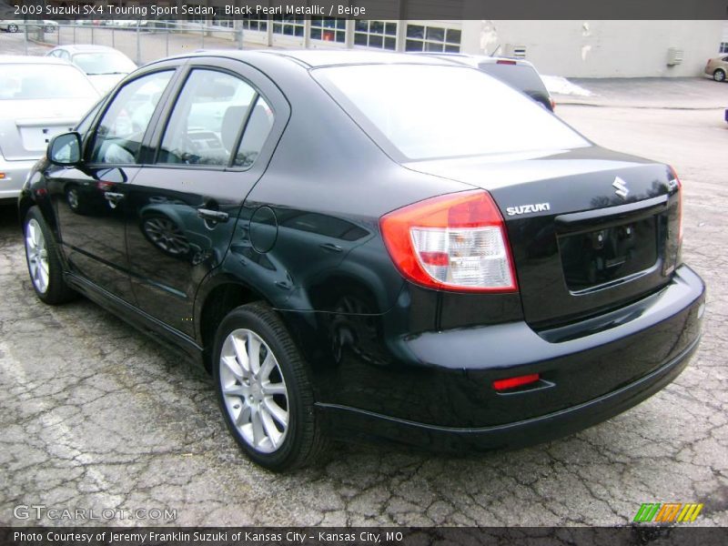 Black Pearl Metallic / Beige 2009 Suzuki SX4 Touring Sport Sedan
