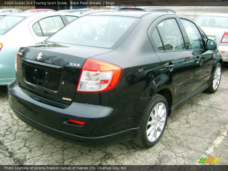 Black Pearl Metallic / Beige 2009 Suzuki SX4 Touring Sport Sedan