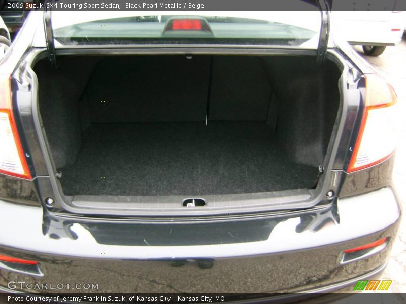Black Pearl Metallic / Beige 2009 Suzuki SX4 Touring Sport Sedan