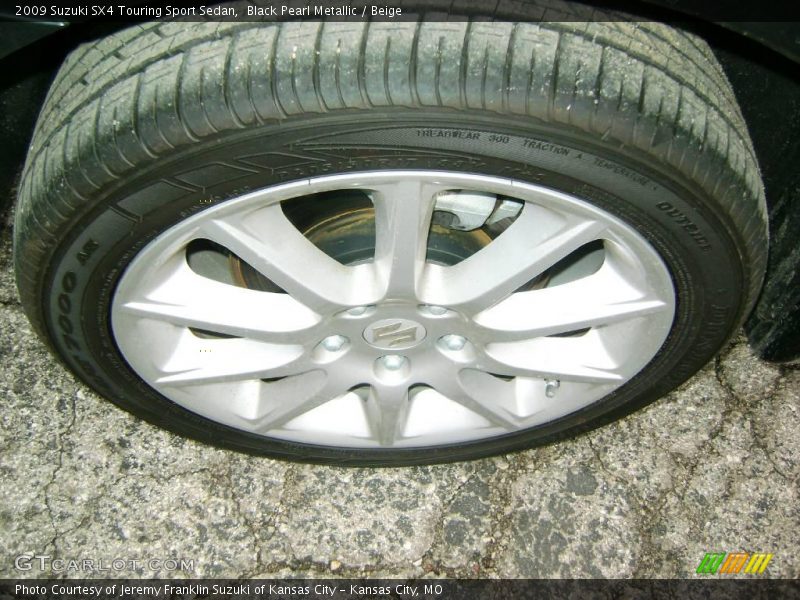 Black Pearl Metallic / Beige 2009 Suzuki SX4 Touring Sport Sedan