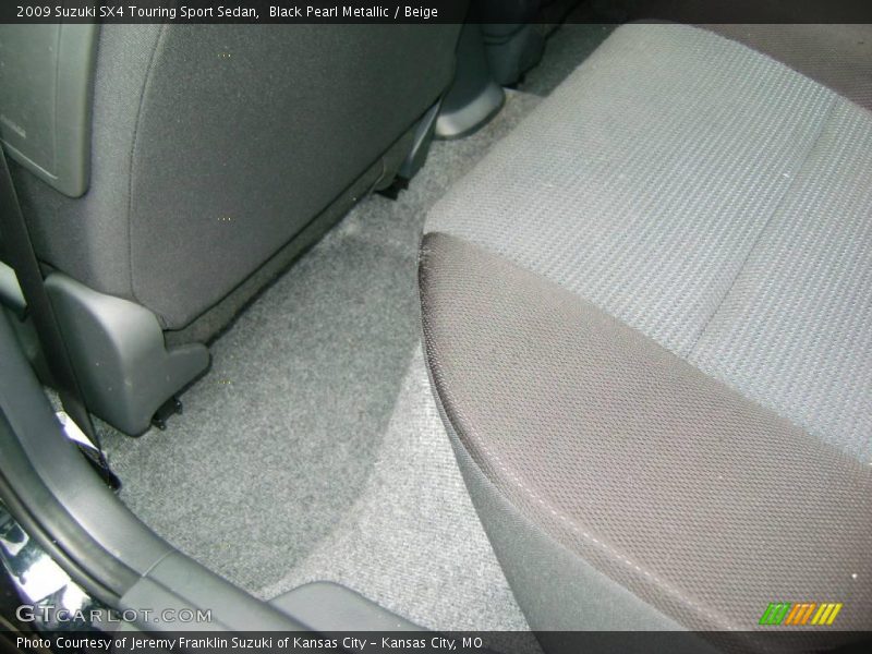 Black Pearl Metallic / Beige 2009 Suzuki SX4 Touring Sport Sedan