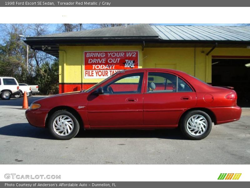 Toreador Red Metallic / Gray 1998 Ford Escort SE Sedan