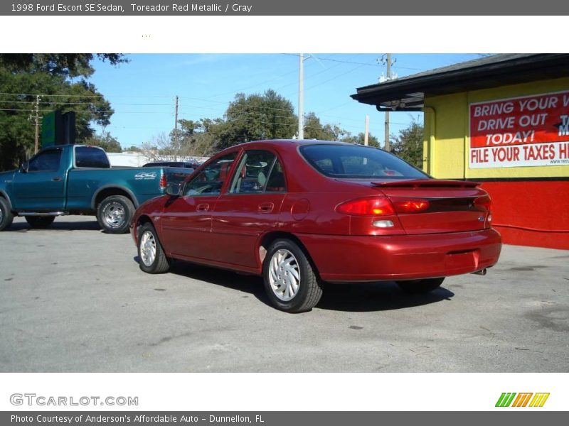 Toreador Red Metallic / Gray 1998 Ford Escort SE Sedan