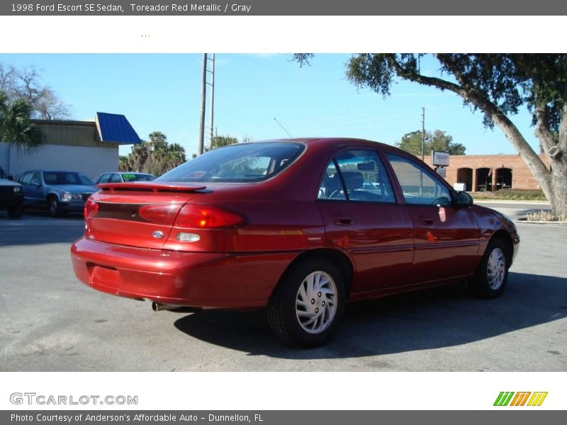 Toreador Red Metallic / Gray 1998 Ford Escort SE Sedan