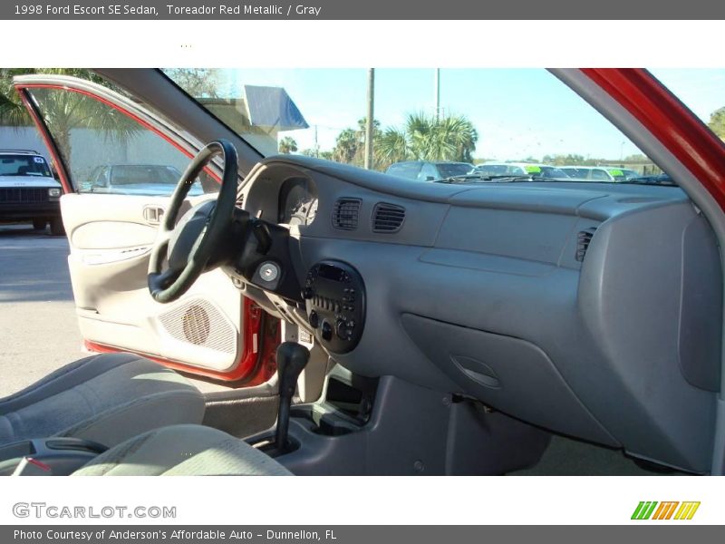 Toreador Red Metallic / Gray 1998 Ford Escort SE Sedan