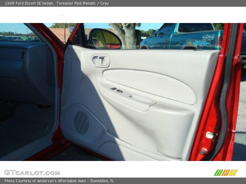 Toreador Red Metallic / Gray 1998 Ford Escort SE Sedan