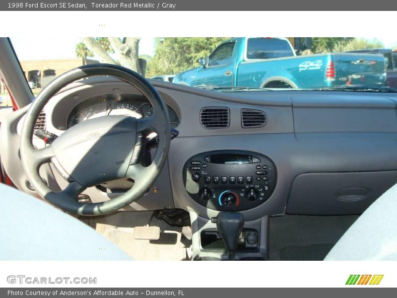 Toreador Red Metallic / Gray 1998 Ford Escort SE Sedan