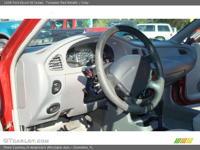 Toreador Red Metallic / Gray 1998 Ford Escort SE Sedan
