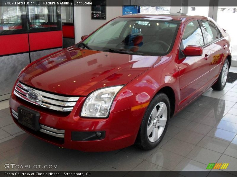 Redfire Metallic / Light Stone 2007 Ford Fusion SE
