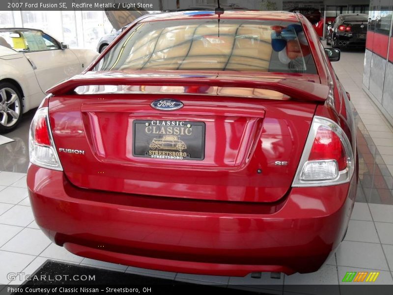 Redfire Metallic / Light Stone 2007 Ford Fusion SE