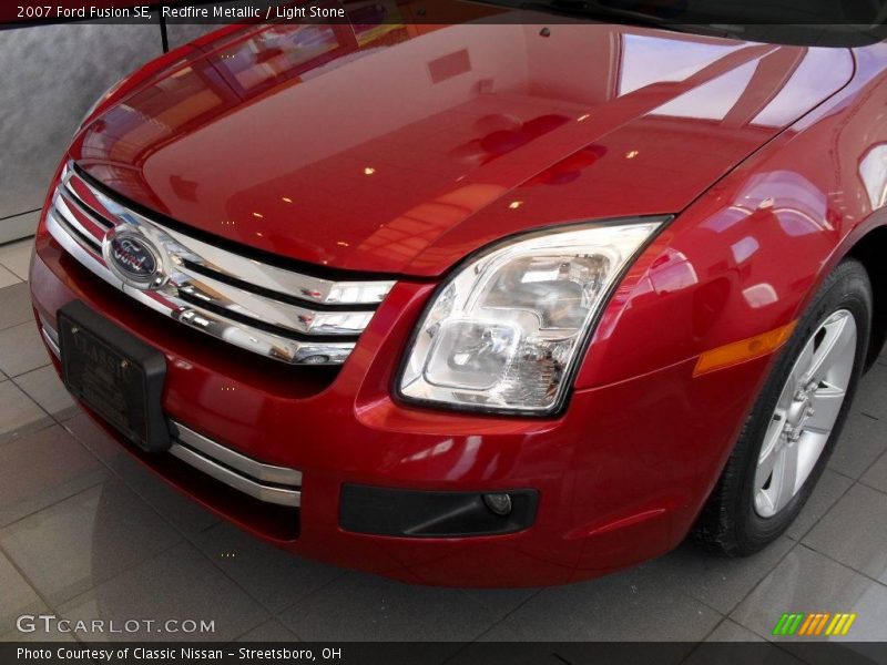 Redfire Metallic / Light Stone 2007 Ford Fusion SE