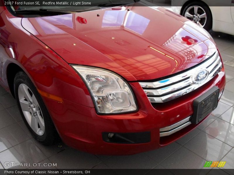 Redfire Metallic / Light Stone 2007 Ford Fusion SE