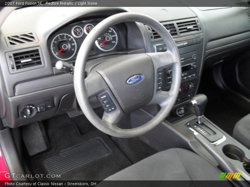 Redfire Metallic / Light Stone 2007 Ford Fusion SE