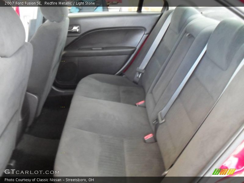 Redfire Metallic / Light Stone 2007 Ford Fusion SE