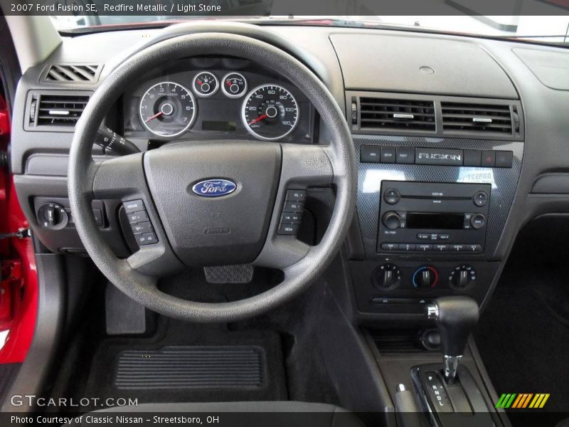 Redfire Metallic / Light Stone 2007 Ford Fusion SE