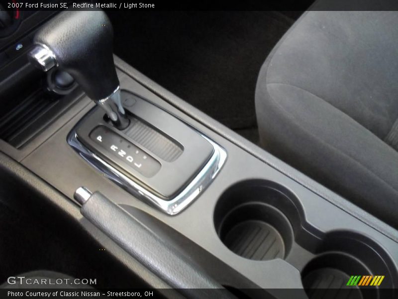 Redfire Metallic / Light Stone 2007 Ford Fusion SE