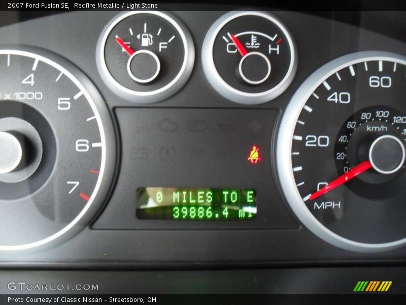 Redfire Metallic / Light Stone 2007 Ford Fusion SE