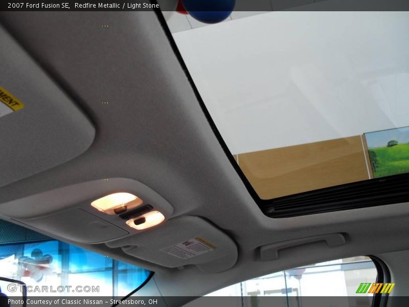 Redfire Metallic / Light Stone 2007 Ford Fusion SE
