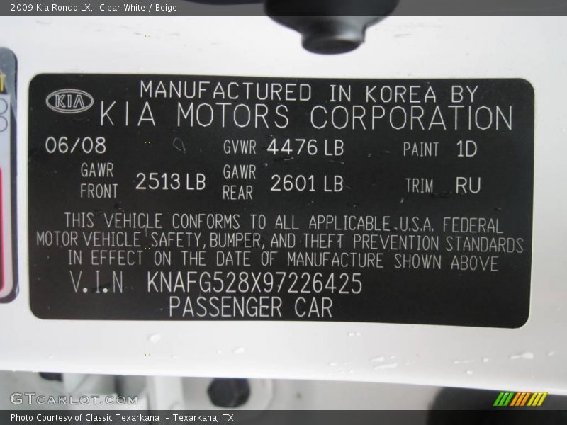 Clear White / Beige 2009 Kia Rondo LX