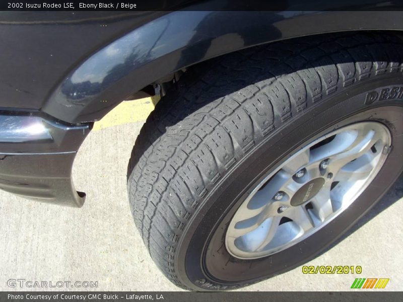 Ebony Black / Beige 2002 Isuzu Rodeo LSE