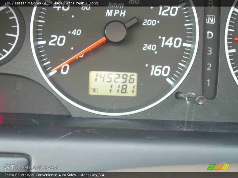 Glacier White Pearl / Blond 2002 Nissan Maxima GLE