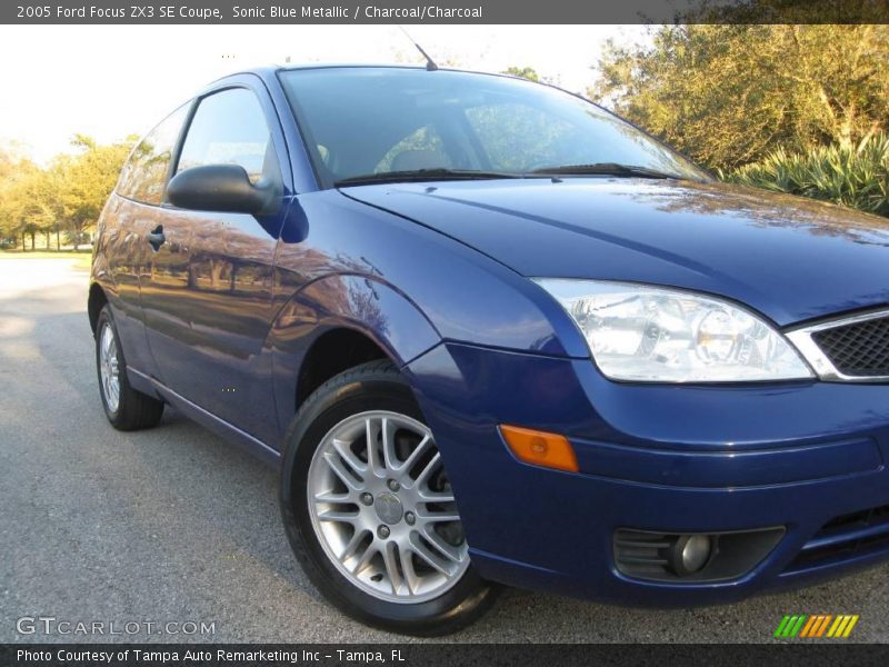 Sonic Blue Metallic / Charcoal/Charcoal 2005 Ford Focus ZX3 SE Coupe