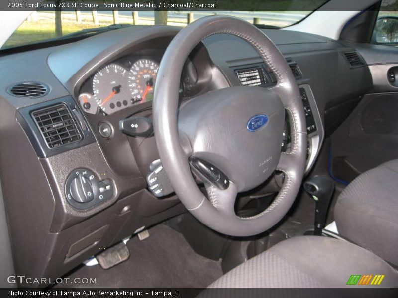 Sonic Blue Metallic / Charcoal/Charcoal 2005 Ford Focus ZX3 SE Coupe